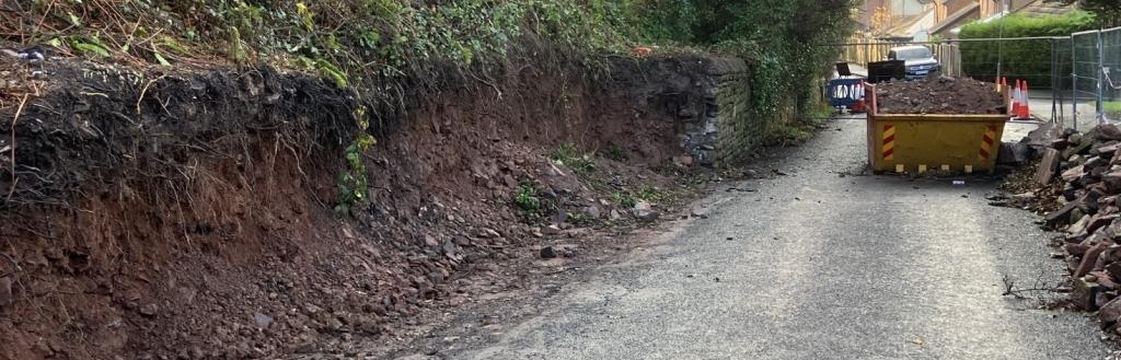The site at Ormsgill Lane where the retaining wall partially collapsed.  
