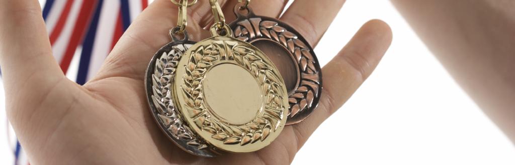 Olympic sports medals hands