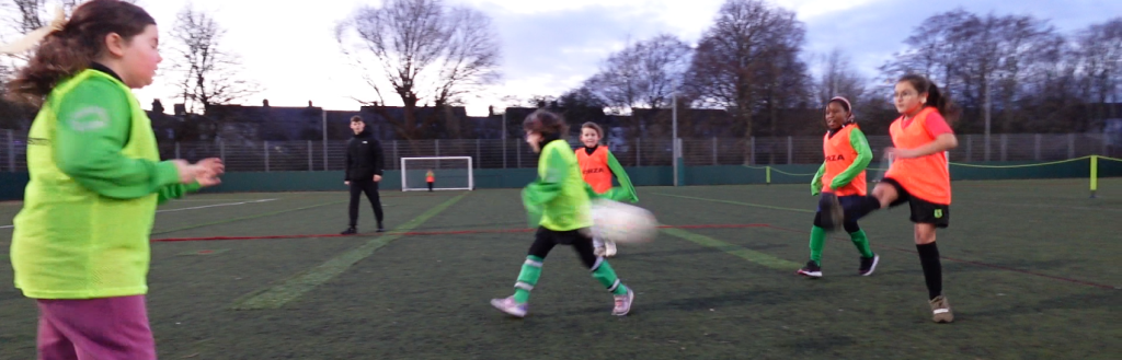 Girls playing football in Barrow