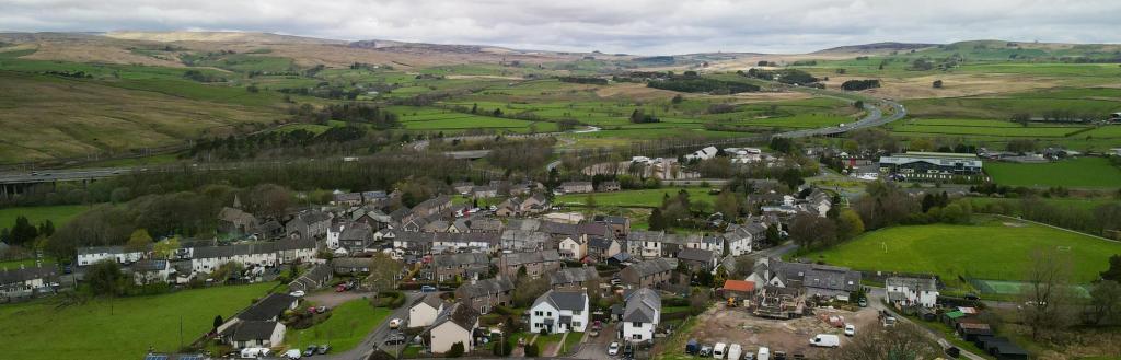 A birds eye view of a rural village in Westmorland and Furness 