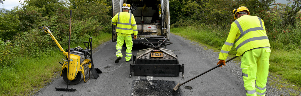 Thermal patching technique being used to fix a pothole