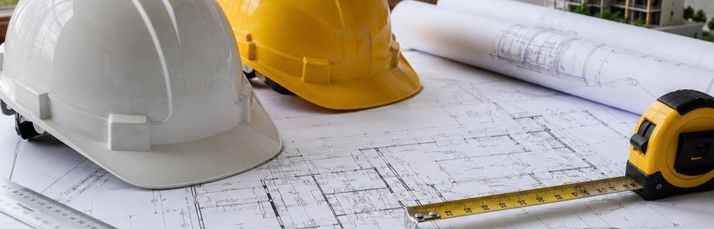 generic image of hard hats and building plans