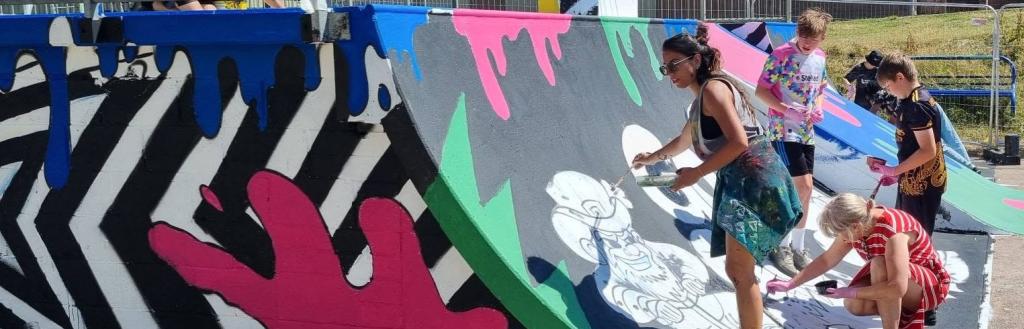 People creating street art at Penrith skate park