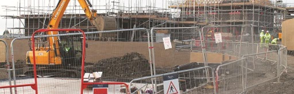 Machinery working on a building site for a new housing development
